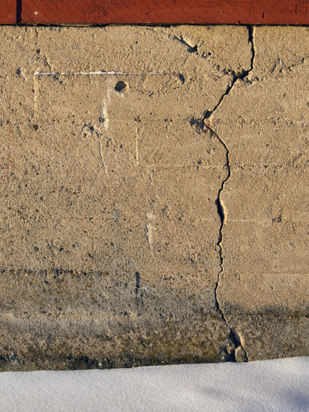 Damage to a wall in the winter months. Giant crack