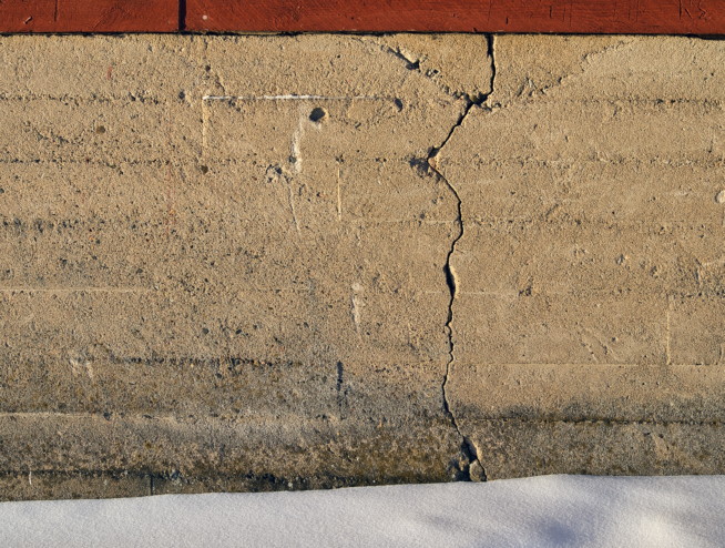 Damage to a wall in the winter months. Giant crack